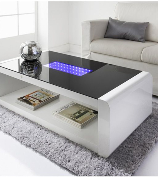Ultra-modern glass and high gloss table featuring LED lights